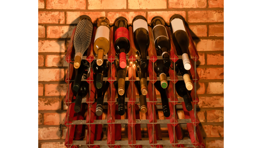 bottles of wine arranged on a wall mounted wine rack